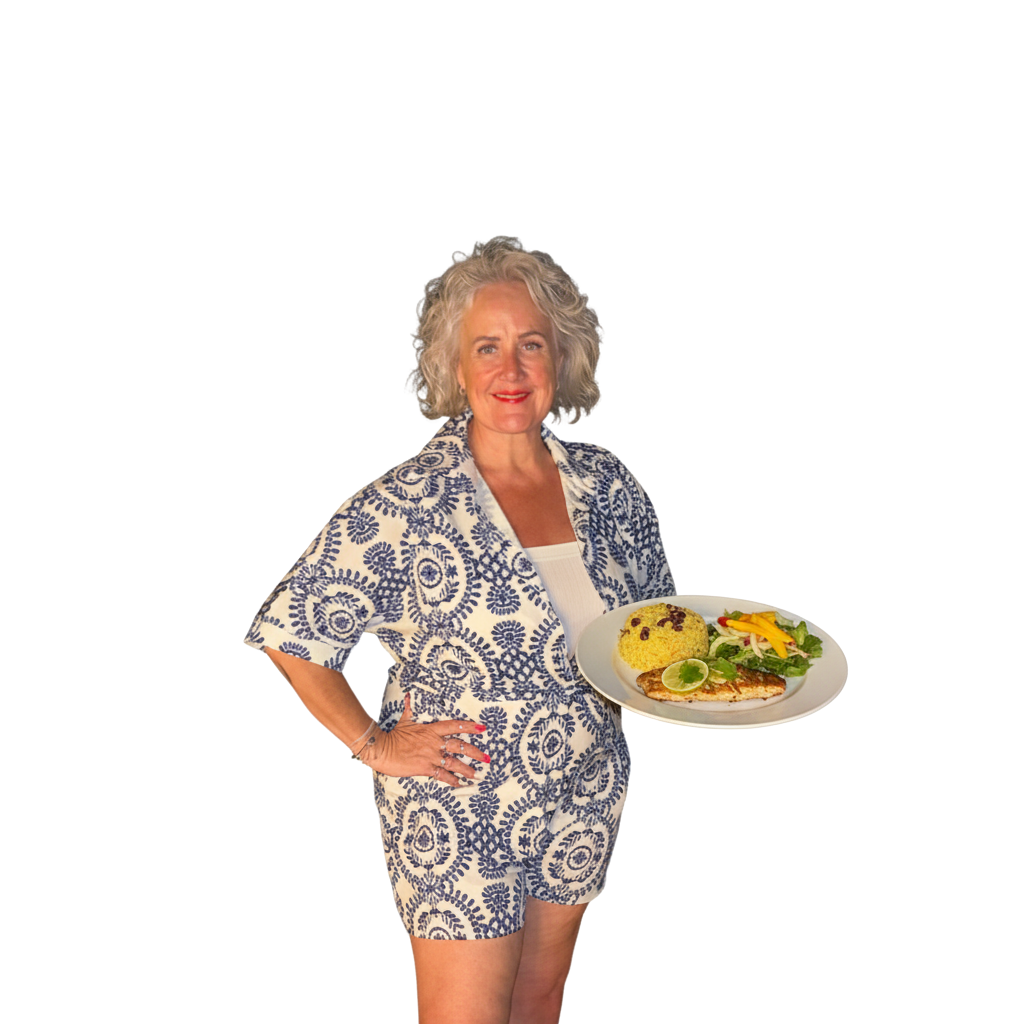 Vicki smiling holding food